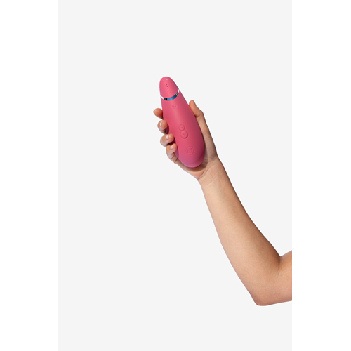 Womanizer Premium 2 Luchtdruk vibrator roze hand 